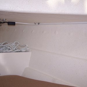 Duplex 8 gauge from switch to Radio Shack project box.  Held in by double sided industrial body shop tape, caulked with 3M 4200