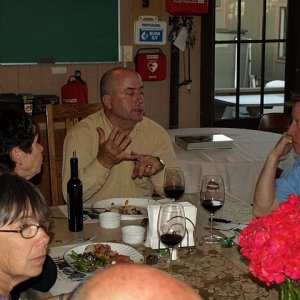 John explains the finer points of boat handling to Jim as Susan comtemplates his analysis.