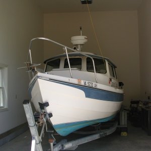 It fits in the new tall Garage, even clears the anchor light over the Radome.