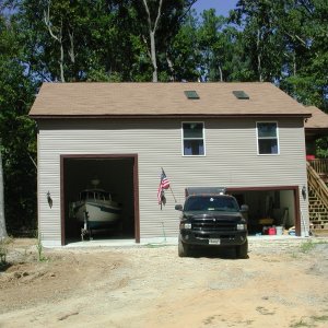 Captain's Choice new Winter Home is finally "complete"  There is a 700SQ Ft apartment over the double garage! Second home to us until the big No Va. house is sold and a house is built here.