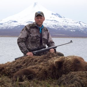 Brother Peter and the Volcano in background. 375 H&H rifle
