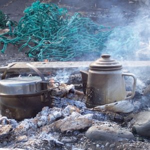 Unimak AK bear hunt 2009 045
Stove didn't work... drift wood fire / fish net for fuel