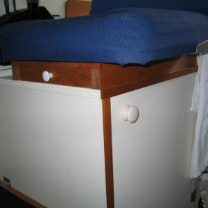 Raised helm seat 2-1/8 inch and added drawer for fishing licenses, registration, etc.