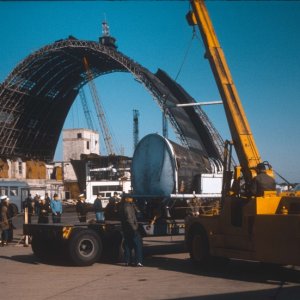 Media '(March is best guess)1966 - NAS So Weymouth, Mass Blimp Hanger dismantling with space capsule, Gemini, after retrieval being loaded for shipment.' in album 'June 1966 - NAS So Weymouth, Mass Blimp Hanger dismantling viewed before collapse -4'