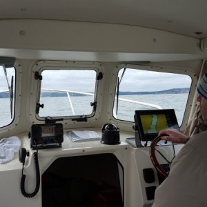 My son, Gary, helping with the first time out. It was windy and choppy except in the cove.
