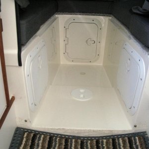 Media 'v-berth storage access 2' in album 'helm - Garmin 498, Ritchie Explorer compass, Xantrex Link 10 house battery monitor, Northstar fuel flow meter, water pressure, volts, trim, tachometer, indoor-outdoor thermometer, Lenco trim tab controller'