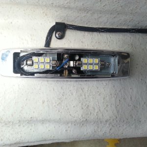 twin marine beam LED bulbs in each of the original Hella fixtures (cover removed)
