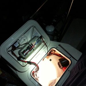 New charger and combiner mounted on new hatch (casually)making the most of space on our little boat
