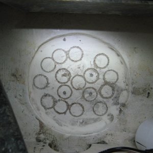 Hole sawed my way down just about 1/4 inch to check balsa and create absorbent surfaces. I could actually see color change from wet to dry as I drilled outward and that was good to see.
