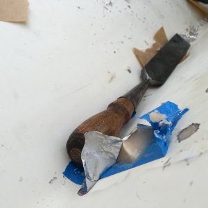 Media 'Peeled off the tape on the reservoir, chiseled it flat (I\'m a good chisel guy.  If you aren\'t a good chisel guy maybe use a sanding block)' in album 'I installed this kicker bracket/swim step that I had fabricated'