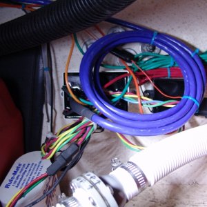 Electronics and extra wire. Main control module on left, auto tab retractors on right.