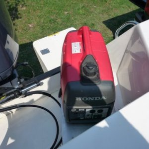 exhaust out the back, motor well to keep noise and fumes at a mimimum,boat should swing into the wind. Summer in New Jersey it's nice to close up the boat and run air conditioning to sleep cool with out the flying critters climbing in bed with you.