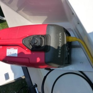 my fuel water separator sits outside on the other end of this motor well and has an extra outlet for me to run a direct fuel line to the generator. I do have a Wise extended run tank.