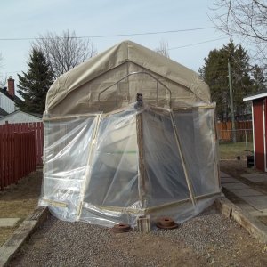 4/22/2011..   front view,hope the sun warms it up inside enough to paint