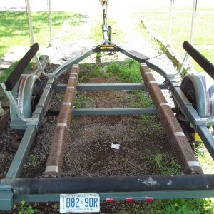 July 11/2011..another view of my EZ-Loader trailer...notice the Duct Tape on the carpeted bunks, never go anywhere without it.