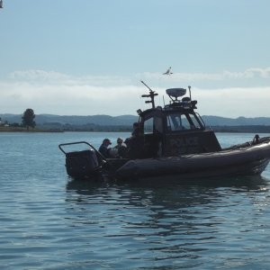 18/08/2011...RCMP Marine Division hard at work talking to a Perch fisherman in his 12 foot boat.You can see the guy and his wife in the bottom left of the picture.