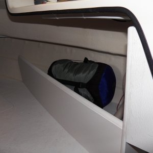 Media 'Because of the angle, it doesn't really effect the amount of usable space in the V berth and adds a lot of room for a week's worth of clothing, etc.' in album 'All of the electrical wiring just hangs loose on the back of the helm, which is in the V berth on the 16.  I've still got a few more modifications (like a negative buss bar) and then I need to cover it up.'