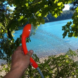 There is a suction cup for the side of the cabin and it's used in the cockpit.  Here, it's used at the hot tub.