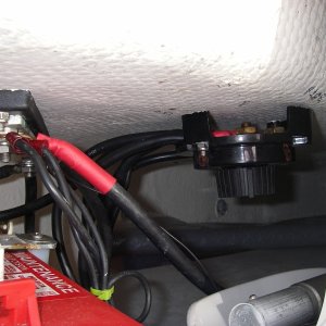 Factory battery Switch relocated to allow 2 battery installation.Relocated  Grounding Bus