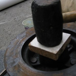 Media 'Us a block of wood and rubber mallet to gently tap the seal into place.  Work around the edges with the mallet and frequently check to make sure it?s going in straight.' in album 'Make sure you have placed a jack stand on each axel.  If your trailer is duel axel only remove one wheel at a time, this provides a higher level of safety.'