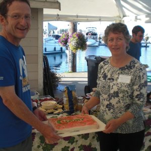 Mike and Monica, Sidney gathering hosts, with home baked C-Dory cake.