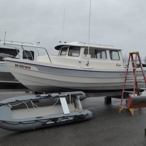 Cleaning up both boats.  The weekend of test-runs was a huge success - New Permatrim, Kaboat, 2.5 Suzuki, Garmin, and 6 hp Kicker. Almost ready for Desolation Sound!