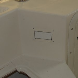 Media 'Macerator and bait switch area will be glassed over' in album 'Factory bait well and aft seat before modification'