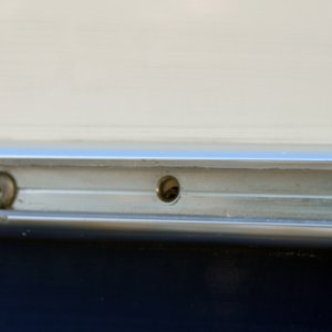 Rubrail, close up of the holes