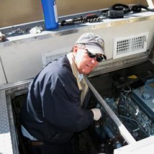 working on one of the cruiseboat engines