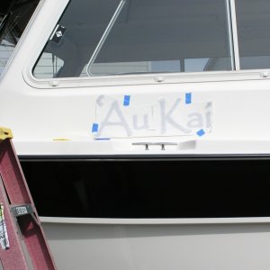 Media 'Lay out; measure.  Step back and look.  Measure again...Getting both sides to "match" was a bit challenging and I'm "anal".' in album 'Boat name applied.  'Au Kai means "Ocean Traveler".'