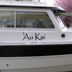 Media 'Came out OK I think.  Black with a gray outline to match the boat.' in album 'Boat name applied.  'Au Kai means "Ocean Traveler".'