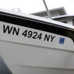 Media 'Cool.  I'm legal!' in album 'Boat name applied.  'Au Kai means "Ocean Traveler".'