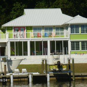 Happiest House I've ever seen, check out the matching boat on the lift. :-}