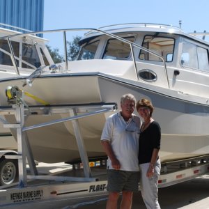 Peter & Linda with their new 2009 Tomcat 255 "Destiny" at Wefings Marine in Eastpoint, Florida September 2009