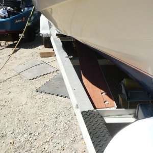 Built a platform (walkway) out of aluminum and trek type composite to make it easy to walk out and attach the bow hook and stay mostly dry (about 20" drier). Rubber non slip 3M things were at Walmart 2 for $7.
