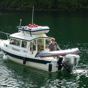 Media 'Sam loading his inflatble kayak' in album 'Seven Please in Tenados Bay'