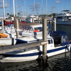 Low tide - the top of the boat is at the same level as the finger dock