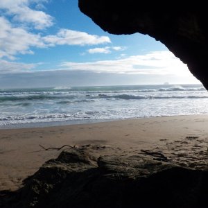 Hot water from the thermal activity above percolates down on to the beach below the high tide line.  Here, with the tide high, there is no activity.