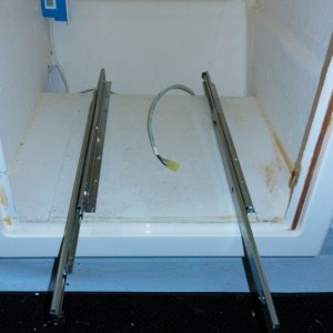 Media 'I used what are called \"pantry slides\" to go underneath the drawer platform.' in album 'This was the standard Norcold install under the copilot seat.'