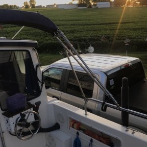 Media 'Bimini can be folded forward when on the water when trolling with the downriggers attached. Or fishing off the back of the cockpit.' in album 'New bimini getting made.  Just some of the frame work.'