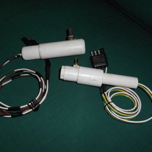 Media 'Switches (Lowes) are 3 way momentary (spring loaded).  The pvc remnants and dowels I already had. Everything slides together and is sealed with 5200.' in album 'Installed windless.  Old hinged deck access port was waterproofed and connector was added so that remote up/down controller (fabricated from pvc and three position switch) could be wired in. Cheap, easy option that works great.'
