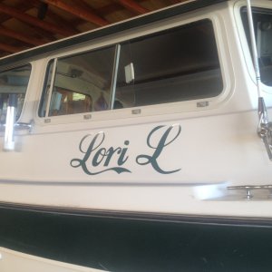 Lori said, our boat has no name on it... Every boat needs a name on it... Soooo, it now has a name on it.