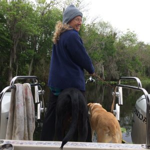 Any fishing reel drag brings both dogs on deck to investigate. Landing a fish causes great excitement for humans and canines alike