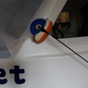 Media 'The sides are fastened to the deck cleat with net float "stand-offs."' in album 'My aerodynamic bug screen.'