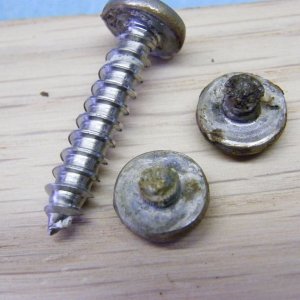 Corrosion of mounting screws on trim tabs. One of the screws on the starboard side, and two on the port side tabs broke off, the others were ok.