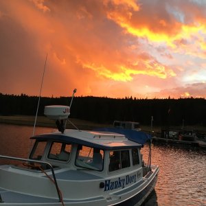 Media 'Spectacular sunset, Bridge Bay Marina, Yellowstone Lake' in album 'Towing Kevin & Laura of \"Montana Kev\" CD22 Grace on their Sea Eagle kayak back up Yellowstone Lake with our Kaboat'
