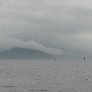 Smooth water, cloudy enroute