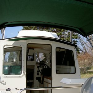 (Valkyrie) Bimini not attached to cabin, allows for free flow of air on a hot day.