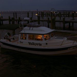 Chesapeake Night.   Note the folded Achilles dinghy strapped to the roof.  A small package for the same inflatable seen in the next picture.  One advantage of a "soft-tail" vs a rigid transom.
