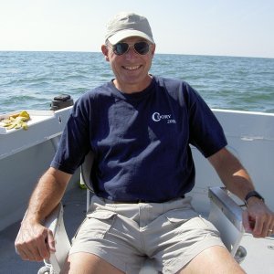 Nick showing off a Gathering shirt on a SC charter.